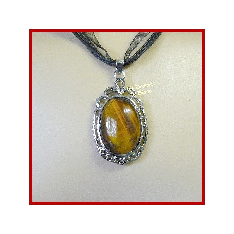 Pendentif en oeil de tigre naturel serti Pendentif en oeil de tigre naturel serti