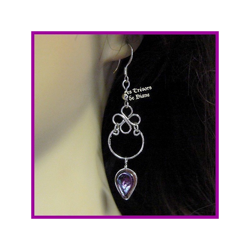 Boucles d'oreilles du Pérou en verre prune Boucles d'oreilles du Pérou en verre prune