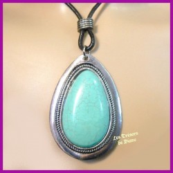 Pendentif médaillon en turquoise naturelle sertie