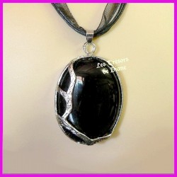 Pendentif en onyx naturelle sertie