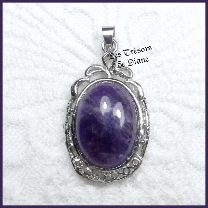 Pendentif en AMETHYSTE brute naturelle sertie Pendentif en AMETHYSTE brute naturelle sertie