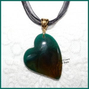 Pendentif COEUR ASYMETRIQUE...